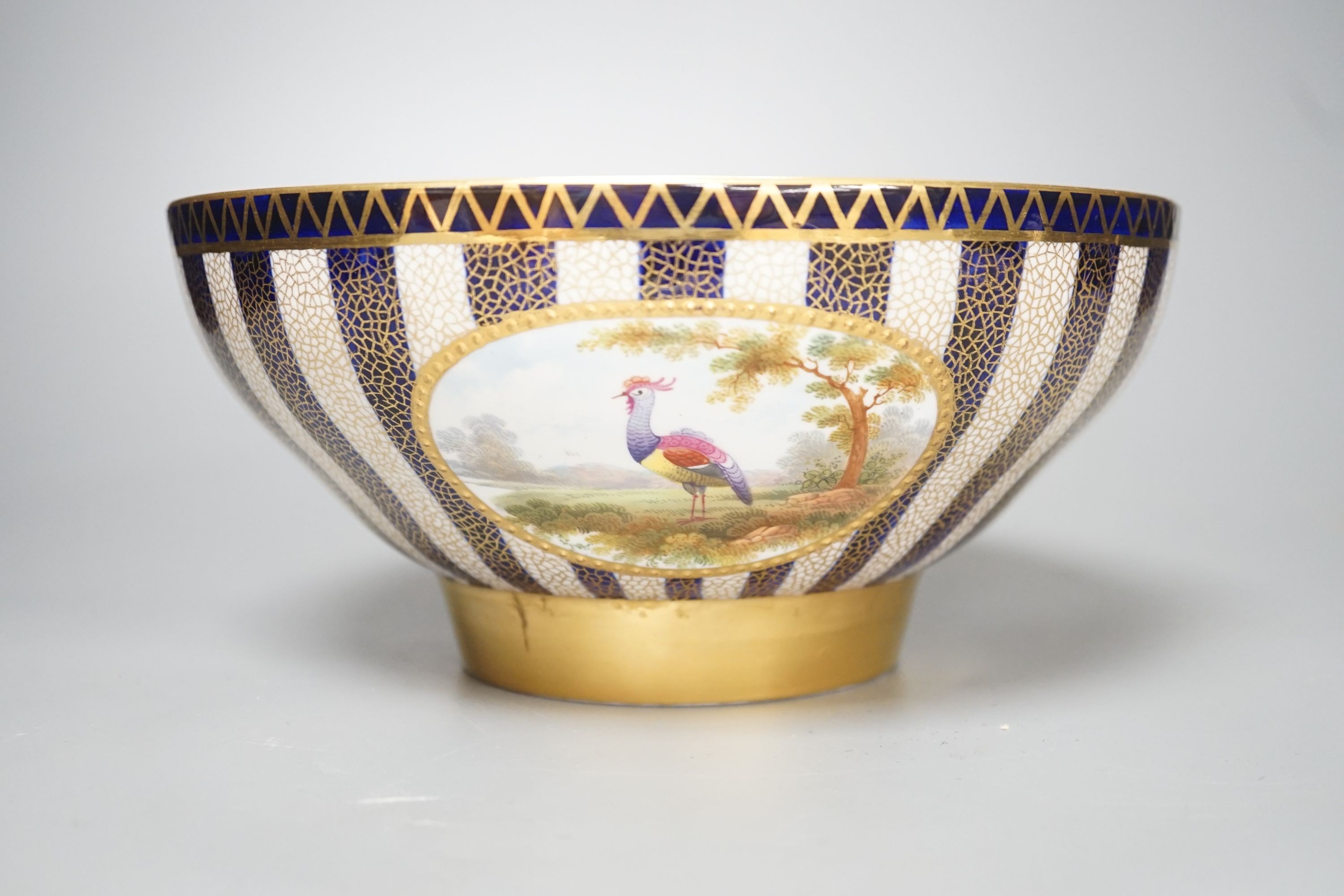 An Aynsley fine bowl with three interior landscape panels and three exterior panels painted with birds between alternating blue and white gilt stripes four panels signed R.J.K. for Richard J. Keeling, c.1910, height 10.5